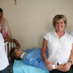 Agano With Kenya Founder Jene Meece with Pascaline and Miriam and Audrey, the plastic patient they practice their skills on at Catholic University nursing school. — Photo courtesy Jene Meece