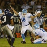 Corona del Mar’s Griff Amies kicks one of his four field goals against rival Newport Harbor High last month. Photos by Jeff Denning