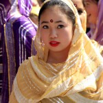 A Sage Hill dancer watches the crowd before heading on stage to perform.