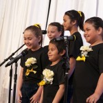 Illumination Foundation kids sing for the audience