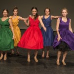 The girls practice a number from show.
