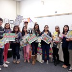 Newport Harbor High School students with some of the games they collected.