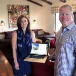 Scott and Jackie Herr in the Corona del Mar home with their Picfari website
