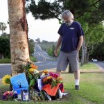 Gary Fain of Irvine visits the accident site on Wednesday.
— Photo by Sara Hall