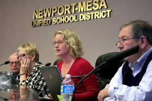 Newport Mesa Unified School District board of education member Katrina Foley poses a question to Newport Beach Police Department Deputy Chief of Police, David McGill, during a special meeting about school safety on Tuesday. — Photo by Sara Hall