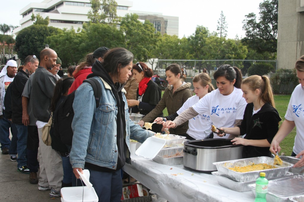 Volunteers dish out food to the needy in Santa Ana on Christmas day.