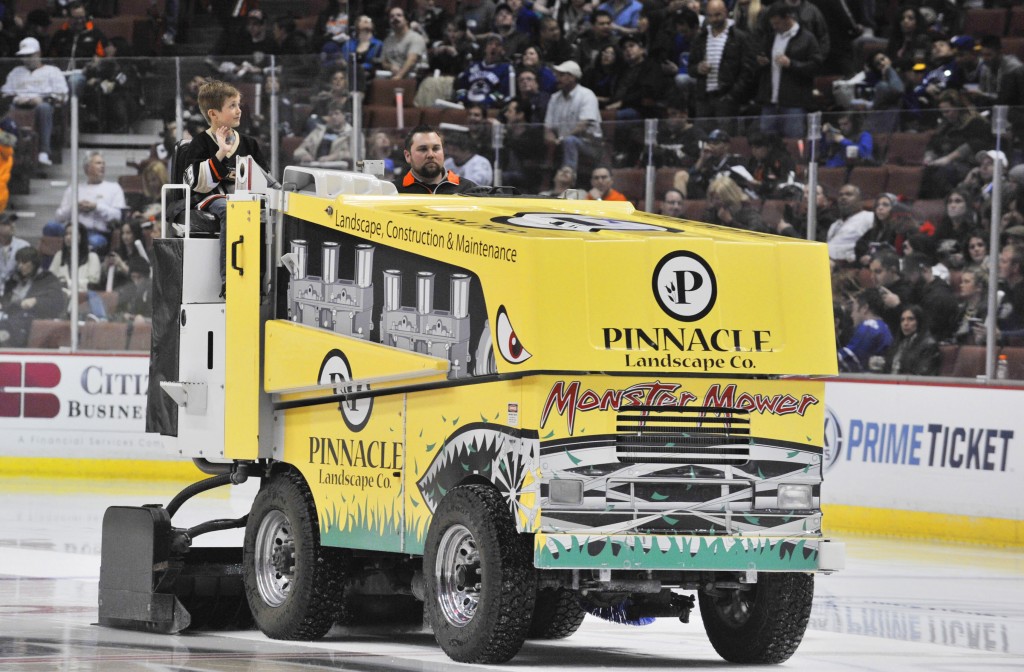 Lucas Marshall of Corona del Mar rides Zamboni during Ducks home opener — Photo by Lawrence Sherwin