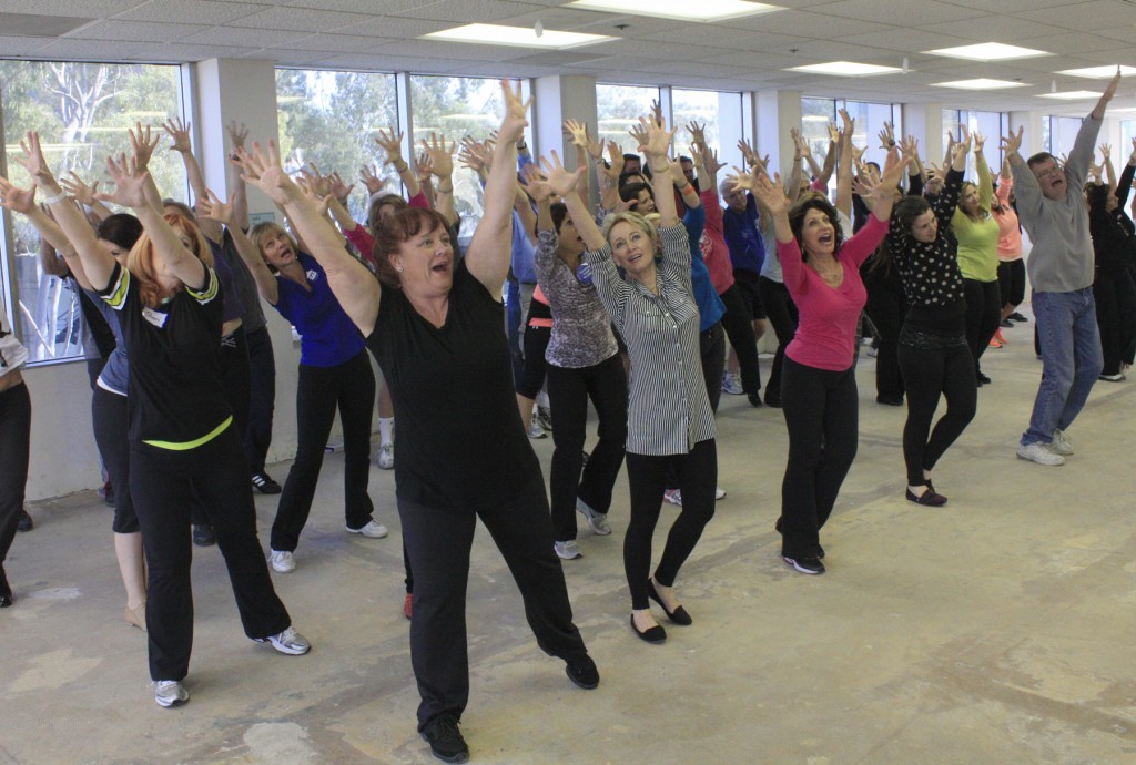 The cast of CHOC Follies rehearsing a dance number.