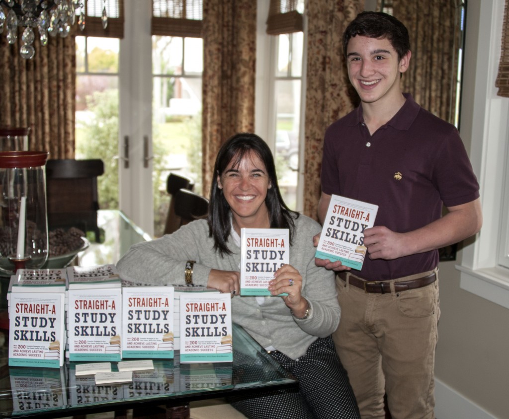 Mother and son co-authors, Cindy and Justin Muchnick, with their book at their Newport Beach home. — Photo by Charles Weinberg