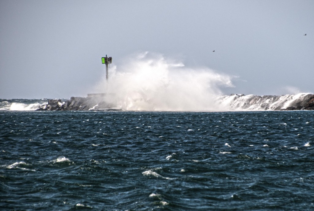 Wild westerly winds whipped wondrous waves over the jetty — Photo by Lawrence Sherwin