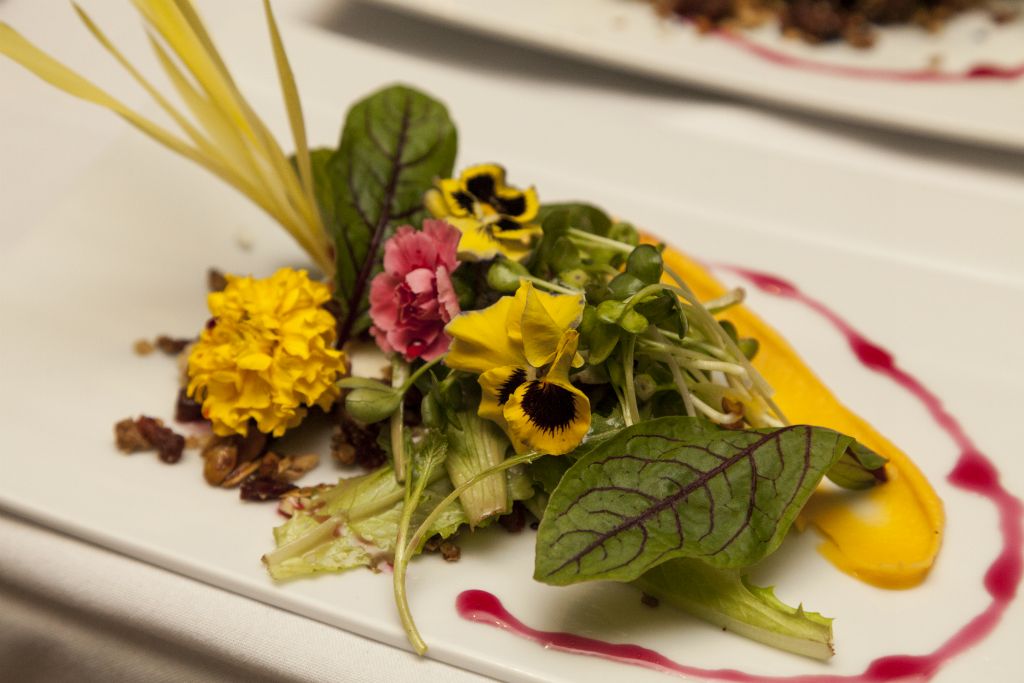 Chef Blaine Villasin of Roy’s Newport Beach created this stunning “Tavern Salad” using organic greens and micro flowers
