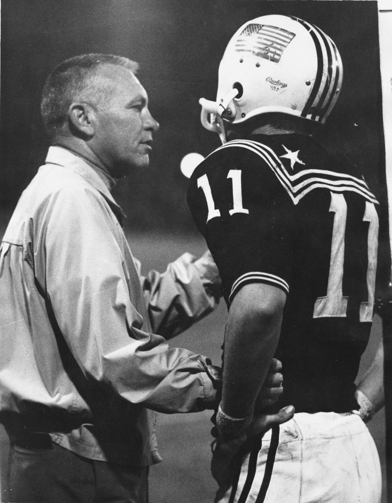 Coach Ernie Johnson, left, is a key figure in the movie "Touchdown Newport."