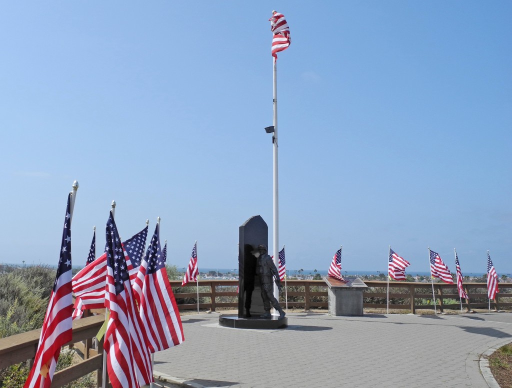 Flags and memorial to American soldiers