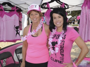 SUP Chicks member Jolene Thompson (left) and SUP Chicks founder Sabrina Suarez and their team raised $20,000 for the cause. 