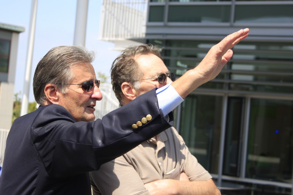 Councilman Ed Selich explains different aspects of the civic center and park to his brother, Dennis, during Saturday's event.