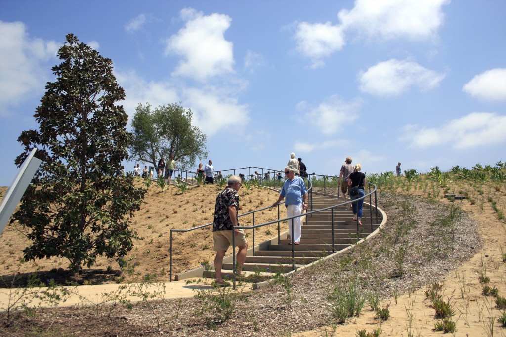 Visitors make their way up some stairs and into the park area of the center. — Photo by Sara Hall