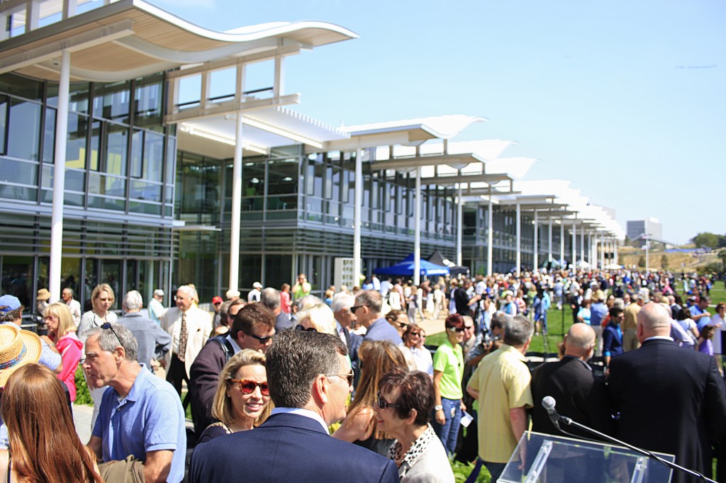 The crowd fills up th elawn at the civic center on Saturday just after the ribbon cutting ceremony ended. — Photo by Sara Hall