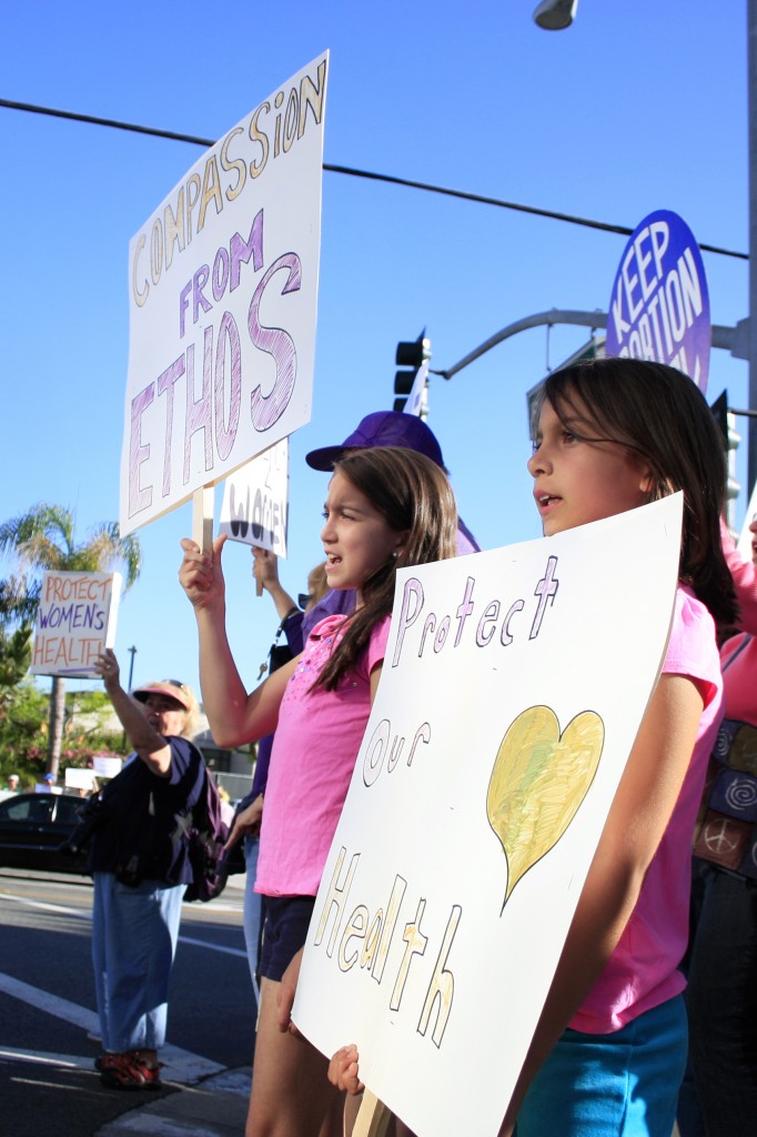 The crowd on both sides of the cause had passionate supporters of all ages, including these two girls.