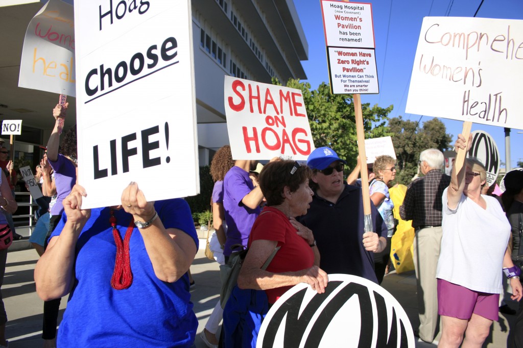 Hoag supporters and protestors gather outside the hospital on Thursday.