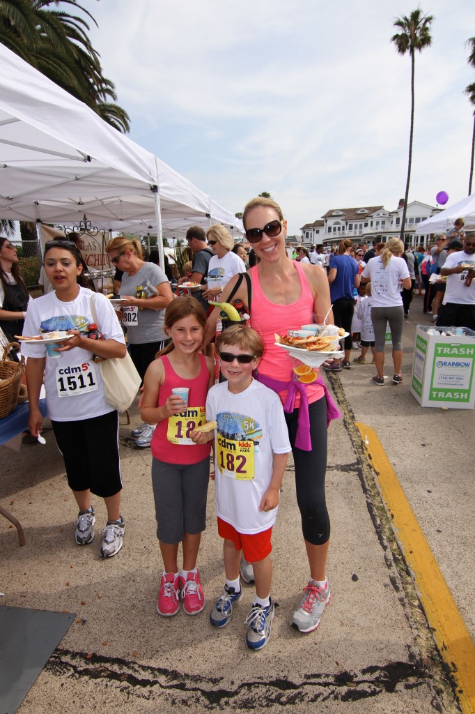 The Yeager family, mom  Sharie,  and kids Chole and Mark, enjoy some food after the race.