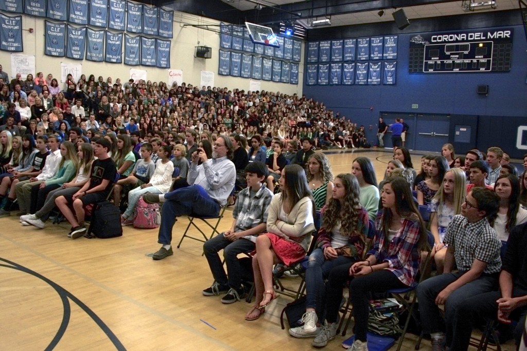 CdM students listen as guest speaker Bill Morris tells a story.