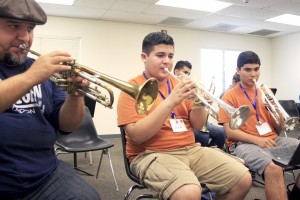 Students in the Advanced Trumpet class practice their song.
