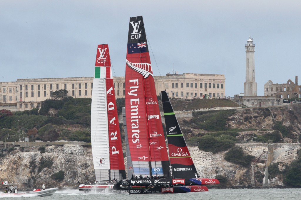 The New Zealand and Italian catamarans are pictured in a practice run alongside Alcatraz Island.