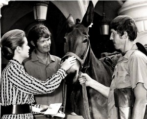 Princess Grace Kelly of Monaco petting Willie Makeit II with Dave and John Kunst.