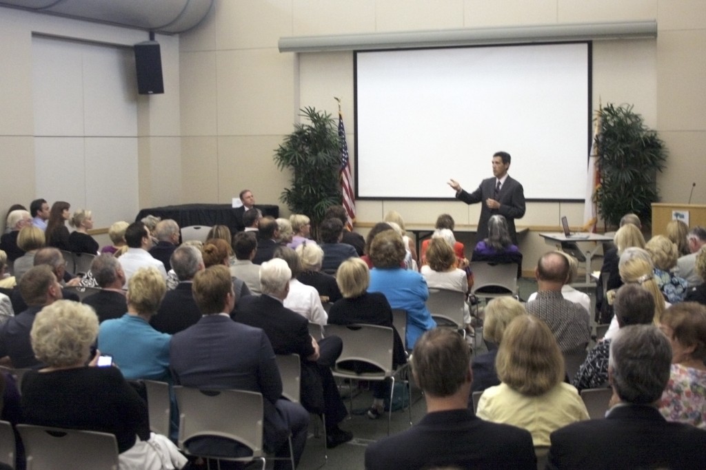 Richard Afable, CEO of Covenant Health Network (the Hoag-St. Joseph Health System alliance), speaks to the crowd at the WAKE UP! Newport meeting on Thursday.