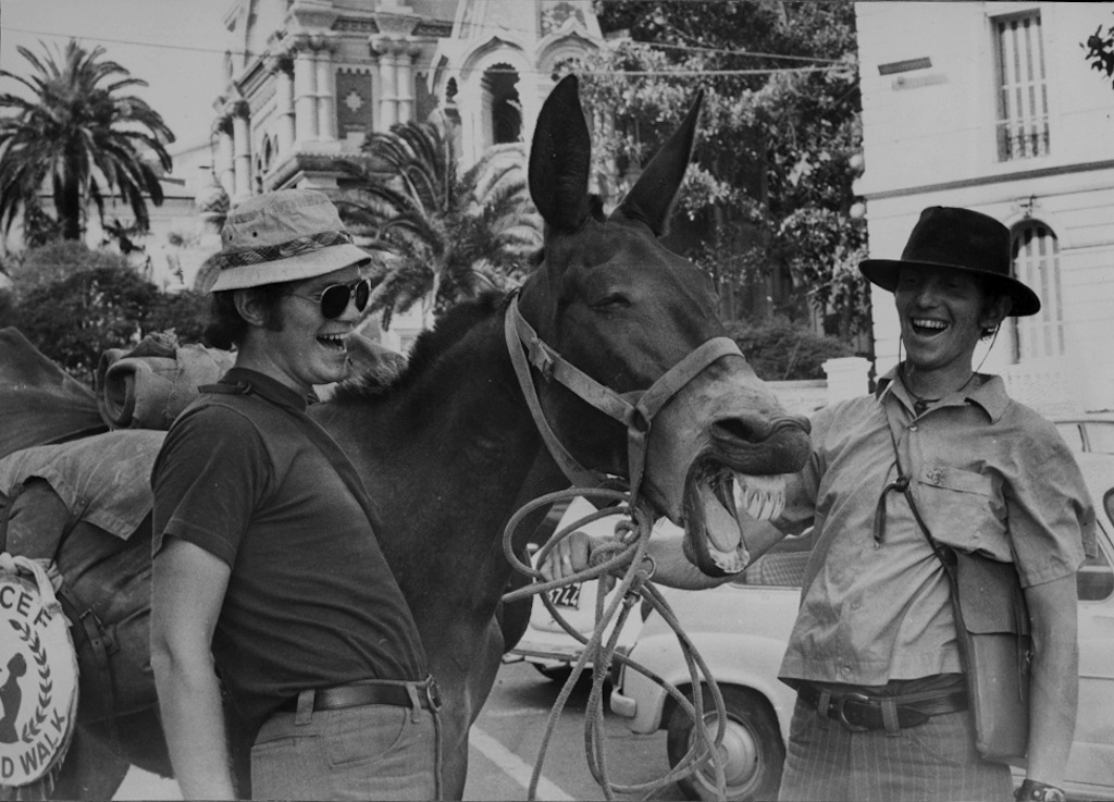 The Kunst brothers Dave and John and one of their mules share a joke in San Remo, Italy.