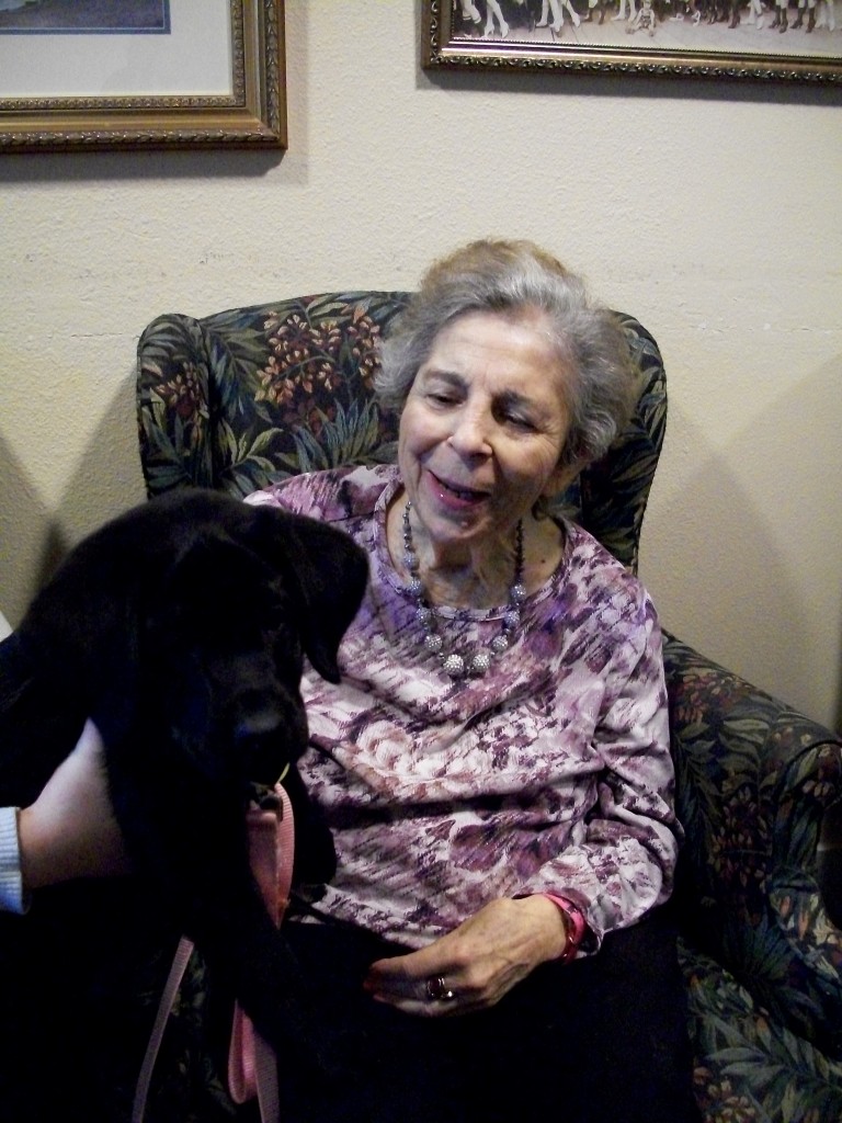 Mary L. with Raja when she was a puppy. — Photo courtesy Jessilyn Guajardo