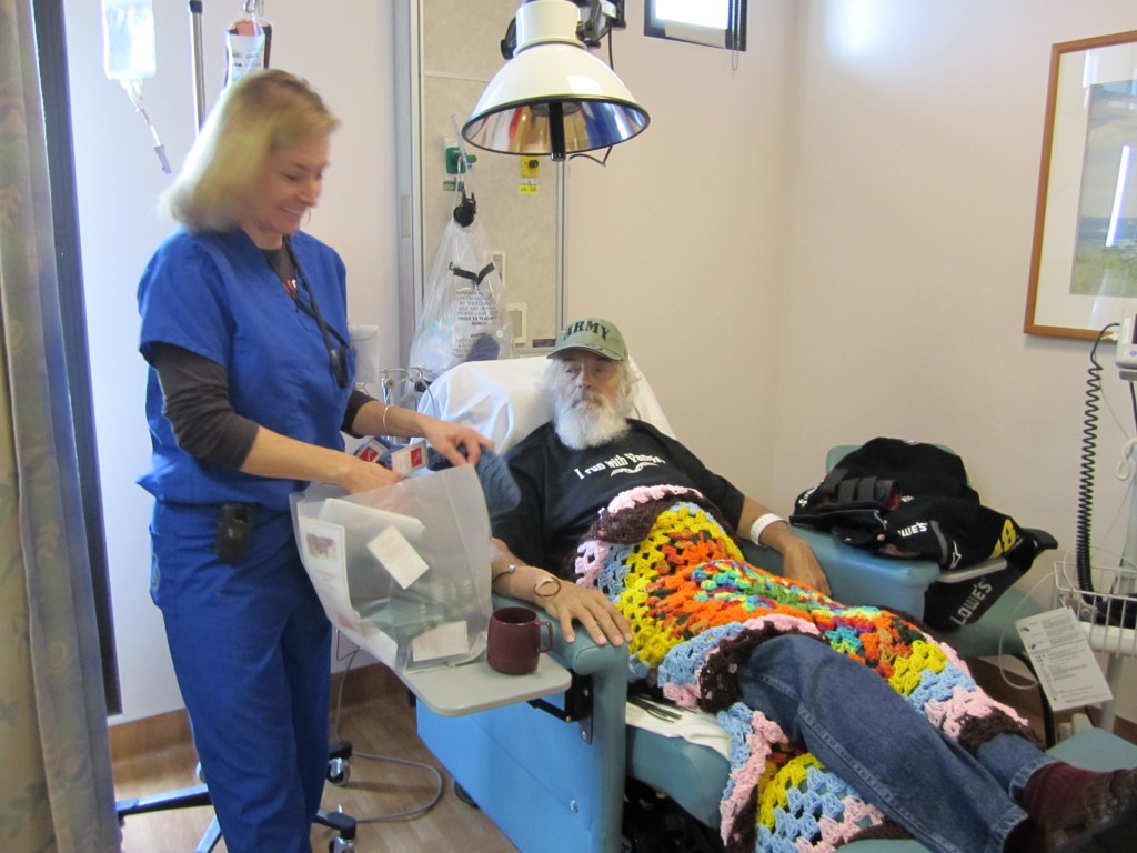 A nurse and veteran going through the bag of caps Knots of Love founder Christine Fabiani delivered to a Veteran's Affairs hospital during last year's VA cap drive.