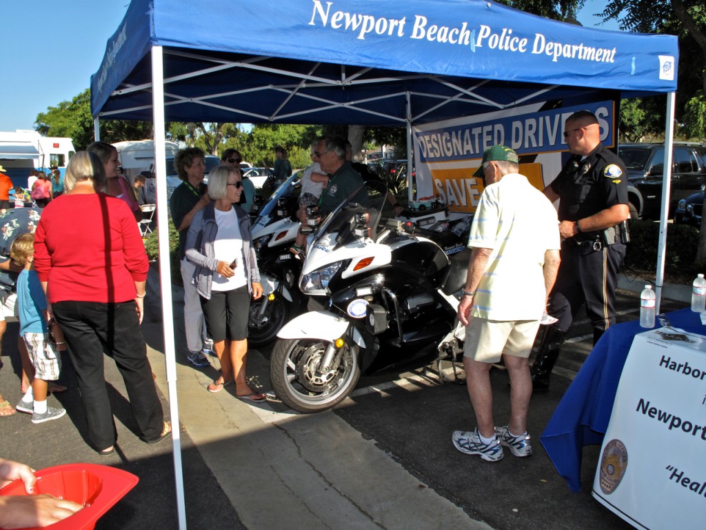 The Newport Beach Police Department's booth at the National Night Out safety fair.  — Photos by Jim Collins
