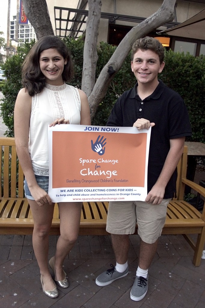 Spare Change for Change founder Isabel Bellino and the CdMHS branch president, Cameron Klein.