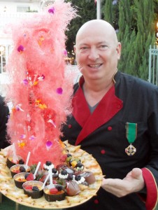 White house owner Bruno Serato with one of his signature desserts