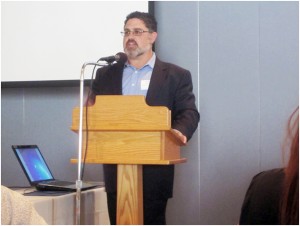 Eric Spitz speaks at the Interfaith Council meeting