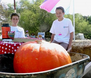 Members of the National League of Young Men Newport Mesa chapter volunteer at the ENC Fall Faire. — Photo by Lori Whalen