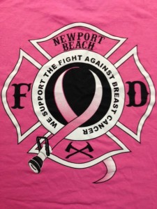 The logo on the back of the Breast Cancer Awareness shirts