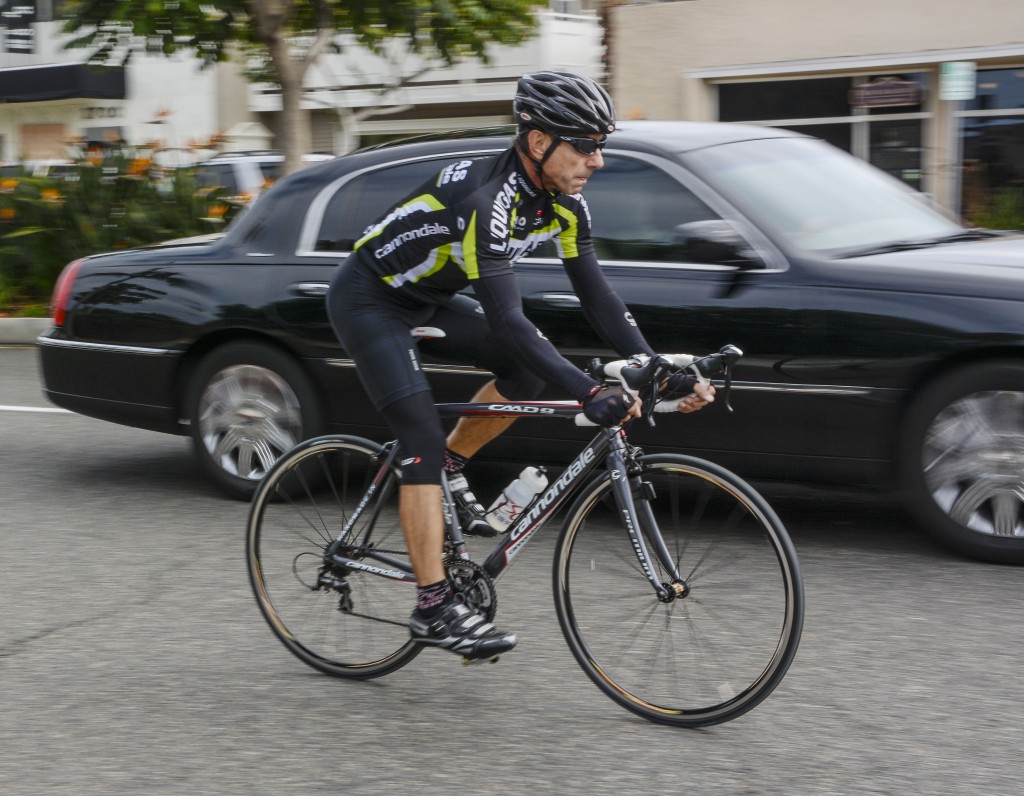 A bicyclist on PCH. — Photo by Lawrence Sherwin