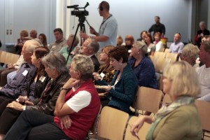 The crowd listens as police chief Jay Johnson speaks about safety in Newport Beach.