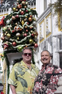 Mark Hurd (right) and Kevin Kramp outside their festive home. — Photo by Sara Hall