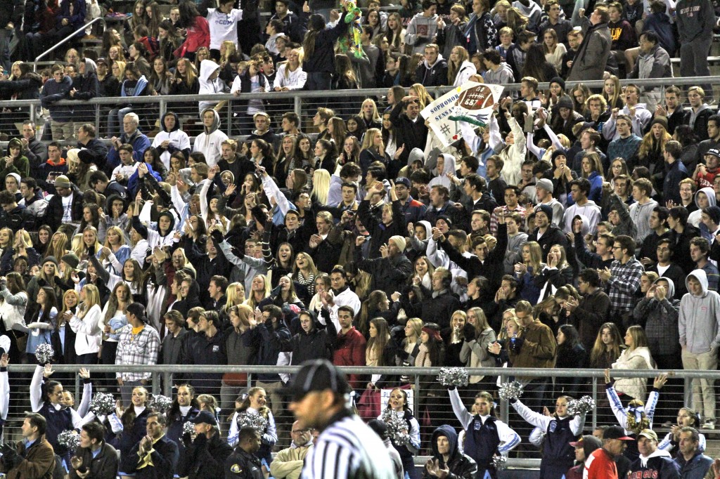 The CdM crowd cheering their team on.