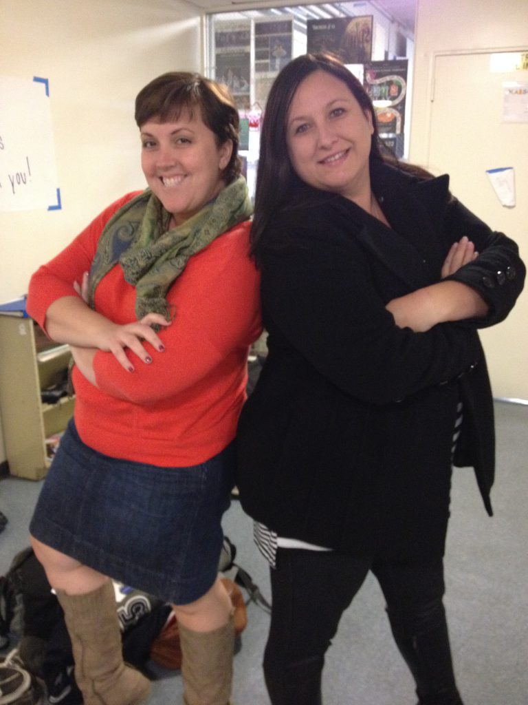 Tina Polychronopoulos (left) and Laura Mayberry strike a pose as they prepare for next week’s “Dancing with the Teachers” performance.