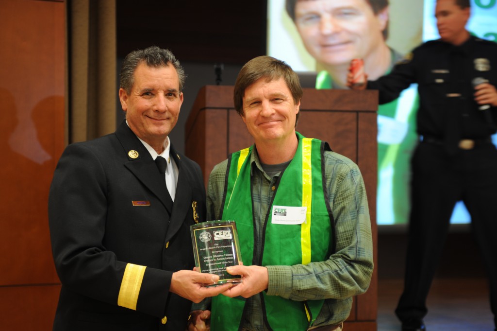 Fire Chief Scott Poster with Jim Gula, leader of Dover Shores Home Owner’s Association, which won Neighborhood of the Year. — All photos by Charles Weinberg