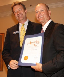 Scott Peotter, representative Field Rep for Assemblyman Allan Mansoor, presented a certificate of recognition to Daniel K. Walker, Chairman of the Board and CEO, Farmers & Merchants Bank.