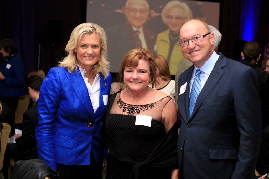 Councilwoman Leslie Daigle (left) with Bill Shopoff and his wife, Cindy.