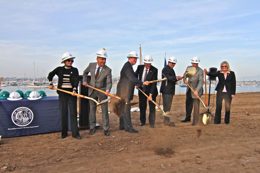 City council members break ground at the Marina Park site on Tuesday, from left to right: Council members Nancy Gardner, Tony Petros and Keith Curry, Mayor Rush Hill, Mayor Pro Tem Ed Selich, and council members Mike Henn and Leslie Daigle — NB Indy Staff