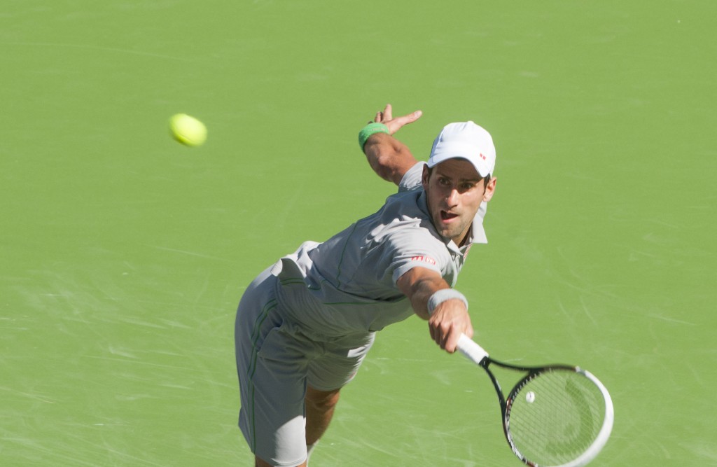 Djokovic diving for a shot.