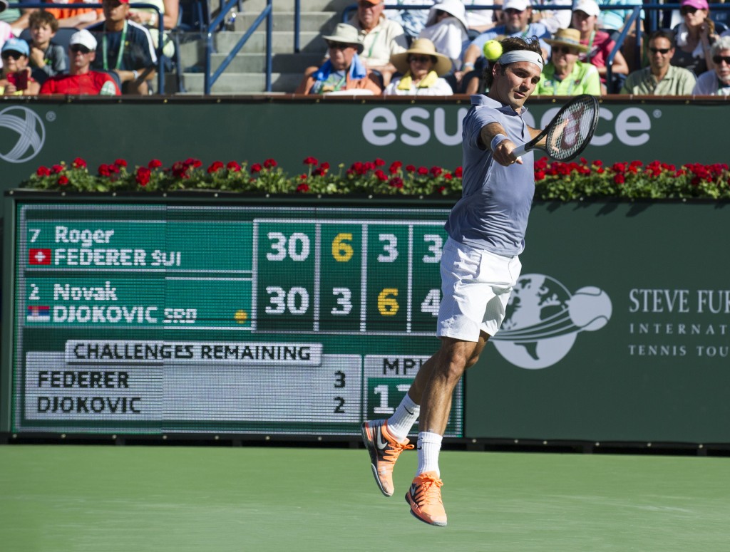  Roger Federer with a classic backhand.