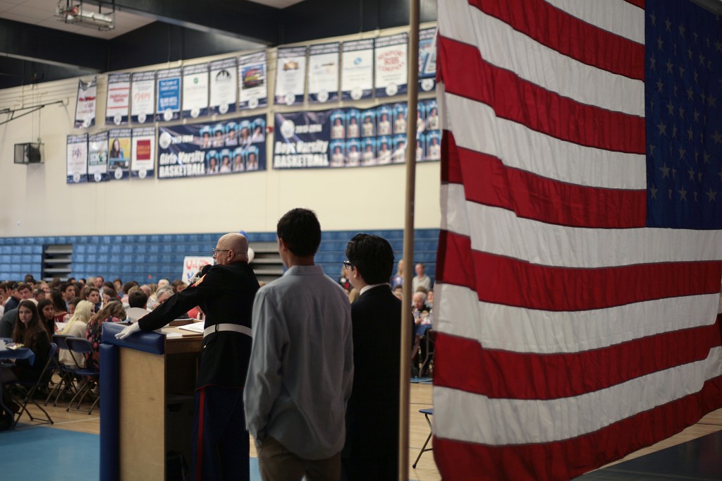 U.S. Marine Corps retired sergeant Frank Orzio gives the invocation at the event.